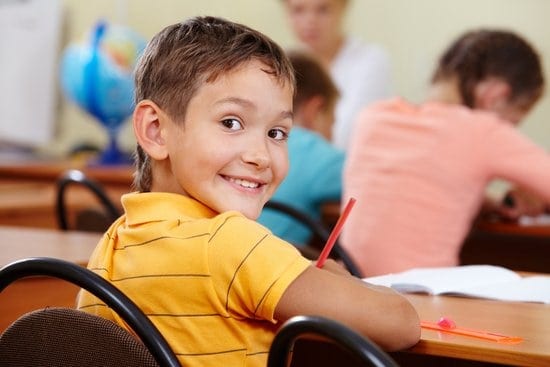 School kid smiling back